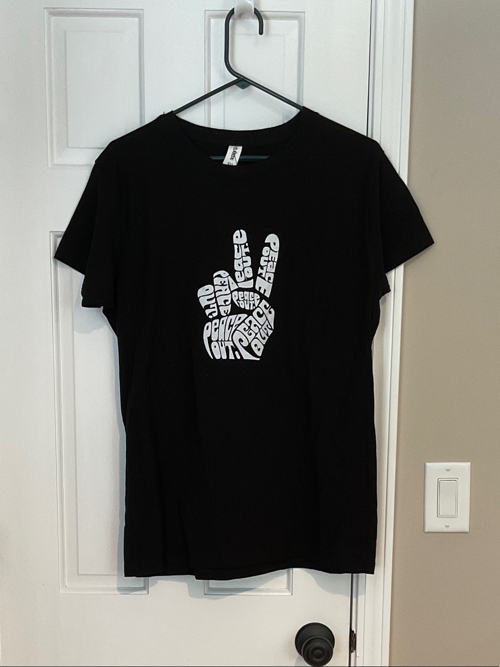 Tultex Black Short Sleeve Tee with White Peace Hand Graphic